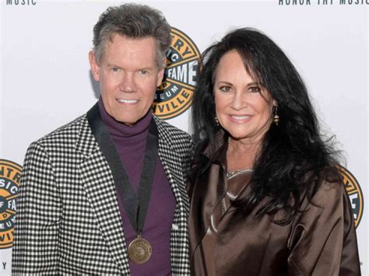 Uncover The Age Of Randy Travis' Wife: Unveiling A Mystery!